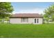Back exterior of house with white siding, brown shutters, and a fenced yard at 5083 Emmert Dr, Indianapolis, IN 46221