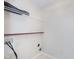 Functional laundry room with shelving, utility connections, and neutral flooring at 5083 Emmert Dr, Indianapolis, IN 46221