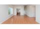 Spacious living room with hardwood flooring and views of adjacent rooms at 5083 Emmert Dr, Indianapolis, IN 46221