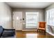 Bright living room featuring hardwood floors, and ample natural light at 5428 E 10Th St, Indianapolis, IN 46219