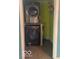 A convenient laundry room with stacked washer and dryer units at 5802 Bertha St, Indianapolis, IN 46241
