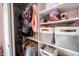 Organized closet featuring clothing rods, shelves, and storage baskets for optimal organization at 5824 W Commonview Dr, McCordsville, IN 46055