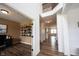 Inviting entryway featuring a high ceiling and beautiful wood-look flooring leading to the upstairs and other rooms at 5824 W Commonview Dr, McCordsville, IN 46055