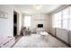 Versatile playroom with ample natural light, stylish decor, and plenty of space for activities at 5824 W Commonview Dr, McCordsville, IN 46055