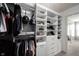 Spacious walk-in closet with custom shelving and rods for organizing clothes and accessories at 5824 W Commonview Dr, McCordsville, IN 46055