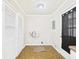 Utility room featuring storage, laundry hookups, and access to the backyard at 602 W 34Th St, Anderson, IN 46013