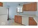 Well-lit kitchen featuring modern appliances and ample countertop space at 6069 E 15Th St, Indianapolis, IN 46219