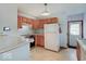 Functional kitchen features ample cabinets and modern appliances at 6069 E 15Th St, Indianapolis, IN 46219