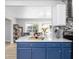Kitchen island with seating and views into the living area at 6143 E 43Rd St, Indianapolis, IN 46226