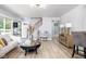Bright living room with hardwood floors, modern decor, and plenty of natural light at 6143 E 43Rd St, Indianapolis, IN 46226