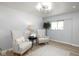Cozy living room with neutral color scheme and comfortable seating at 6143 E 43Rd St, Indianapolis, IN 46226