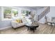 Cozy living room featuring a comfortable sofa, stylish coffee table, and bright natural lighting at 6143 E 43Rd St, Indianapolis, IN 46226