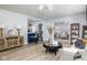 Open concept living space featuring modern decor, a breakfast bar, and plenty of room for entertaining at 6143 E 43Rd St, Indianapolis, IN 46226