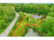 Aerial view of property and pond with boundary lines superimposed over image at 6462 Wings Ct, Brownsburg, IN 46112