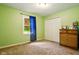 Bright bedroom with a neutral carpet, a closet, and natural light from the window at 6462 Wings Ct, Brownsburg, IN 46112
