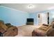 Cozy living room with plush sofas, TV and neutral carpet, perfect for relaxing at 6462 Wings Ct, Brownsburg, IN 46112