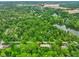 Aerial view of the area, highlighting the property's proximity to North Madison Elementary and nearby lake at 6794 E Ann St, Camby, IN 46113
