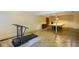 Spacious finished basement with a pool table under cover and a treadmill for exercise at 6794 E Ann St, Camby, IN 46113