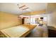 Finished basement featuring a pool table, exercise equipment, and walk-out access at 6794 E Ann St, Camby, IN 46113