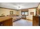 Comfortable bedroom with ceiling fan, floral wallpaper border, and lots of light at 6794 E Ann St, Camby, IN 46113