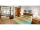 Inviting bedroom with mirrored closet and a geometric patterned comforter at 6794 E Ann St, Camby, IN 46113