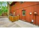Wood deck featuring a back door to the home, swing and barbecue area at 6794 E Ann St, Camby, IN 46113