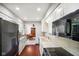 Efficient kitchen with white cabinets, granite countertops and dark appliances at 6794 E Ann St, Camby, IN 46113