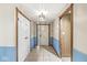 Entryway featuring tile floors and front door at 7503 Grandview Dr, Indianapolis, IN 46260