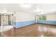 Inviting living area with wood-look flooring and natural light at 7503 Grandview Dr, Indianapolis, IN 46260