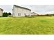 Spacious, green backyard offering plenty of room for outdoor activities and recreation at 7604 Cloudy Ct, Camby, IN 46113