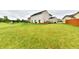 Expansive backyard with lush green lawn, perfect for outdoor activities and enjoying the peaceful surroundings at 7604 Cloudy Ct, Camby, IN 46113