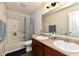 Standard bathroom with double sink vanity, bath tub and shower with curtain at 7604 Cloudy Ct, Camby, IN 46113