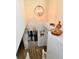 View from above of the foyer with access to the basement gym and stairway at 7604 Cloudy Ct, Camby, IN 46113
