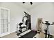 Bright exercise room with gym equipment for a full-body workout at 7604 Cloudy Ct, Camby, IN 46113
