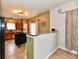 Open-concept kitchen boasts granite counters, dark wood cabinets and stainless appliances at 7604 Cloudy Ct, Camby, IN 46113