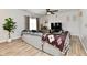 Comfortable living room with a ceiling fan, sleek television, and modern furniture at 7604 Cloudy Ct, Camby, IN 46113