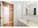 Bright bathroom with storage, vanity and shower stall at 7645 Briarstone Ln, Indianapolis, IN 46227