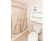 Bathroom featuring a toilet and a shower with sliding doors at 7645 Briarstone Ln, Indianapolis, IN 46227