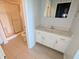 Bathroom with a vanity, mirror, toilet, and walk-in shower with sliding glass doors at 7645 Briarstone Ln, Indianapolis, IN 46227