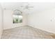 Spacious bedroom features a ceiling fan and large window letting in plenty of natural light at 7645 Briarstone Ln, Indianapolis, IN 46227