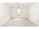 Neutral bedroom features a ceiling fan, window, and carpeted floors at 7645 Briarstone Ln, Indianapolis, IN 46227