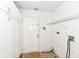 Mudroom with side-by-side pantry, tile floors, and access to the outdoors at 7645 Briarstone Ln, Indianapolis, IN 46227