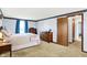 Bright main bedroom featuring carpet and lots of closet space at 7670 Lippincott Way, Indianapolis, IN 46268
