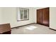 A cozy bedroom featuring a large closet and a bright window with outdoor views at 781 Dayton Dr, Carmel, IN 46033