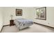 This bedroom offers neutral carpeting, a window view, and is well illuminated at 781 Dayton Dr, Carmel, IN 46033