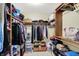 Spacious walk-in closet with custom shelving and ample storage space for clothing and accessories at 781 Dayton Dr, Carmel, IN 46033