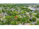 Aerial view of a residential neighborhood with tree-lined streets and well-maintained homes shows community charm at 7835 E 50Th St, Indianapolis, IN 46226