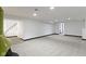 Finished basement with new carpeting and a vintage fireplace at 7835 E 50Th St, Indianapolis, IN 46226