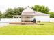 Enjoy this expansive backyard with an in-ground pool and covered patio area in the back at 7895 E 175 N, Franklin, IN 46131