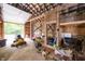 Barn interior with a lawnmower, trimmer, and other yard equipment at 7895 E 175 N, Franklin, IN 46131